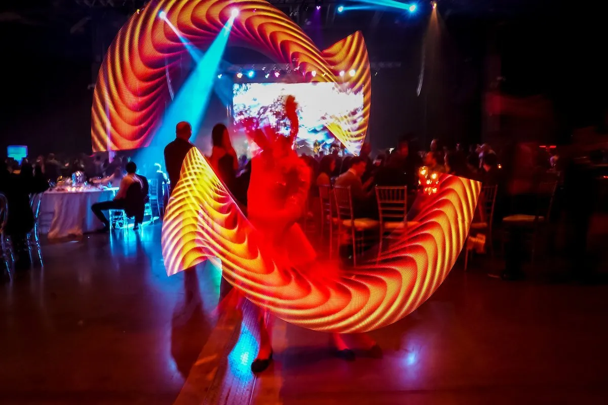 A performer at an Expedia Group event